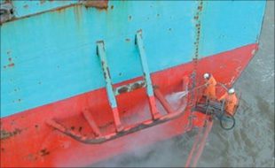 high pressure water jetting machine being used in shipyard